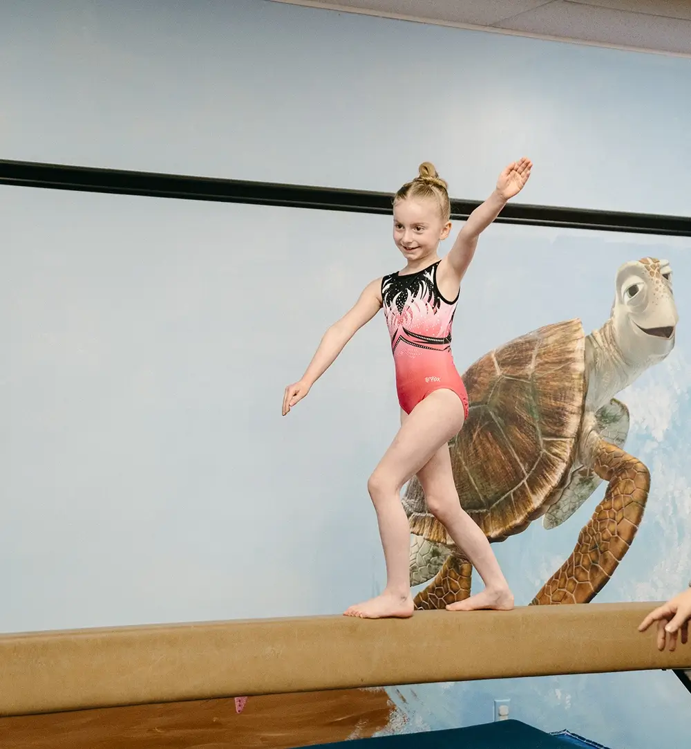 a kid doing gymnastics