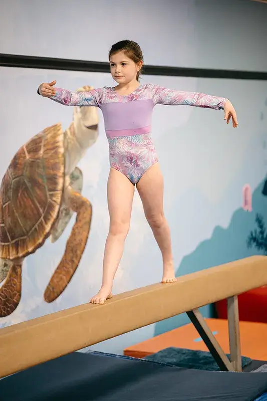 a kid doing gymnastics