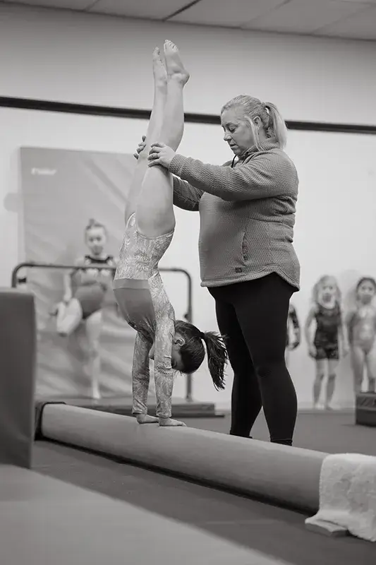 a kid doing gymnastics